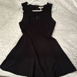 Black mini dress with A line skirt. Worn once